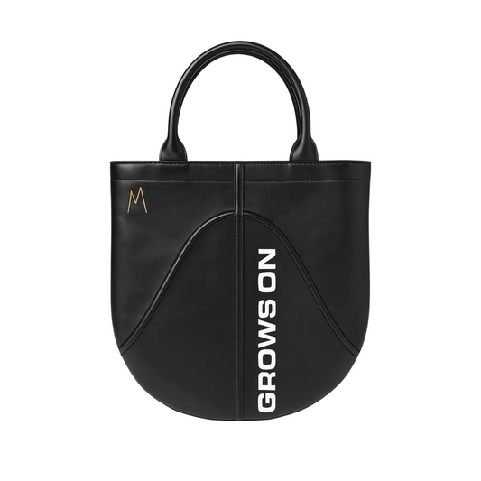 Black premium bag with 'GROWS ON' text by Round21, the WNBA with Marsai Martin by Maya Winston. WNBA bag. Women's Basketball Bag.